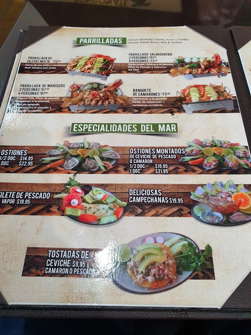 Shared tables in a cozy Salvadoran restaurant.